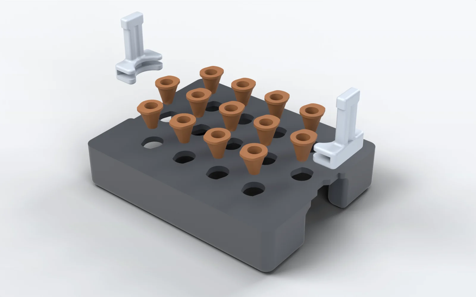 An exploded view of the floating plate: the grey slab with thirteen bores, the thirteen tapered seed holders lifted above it, and the two white clip-in handles at either end.