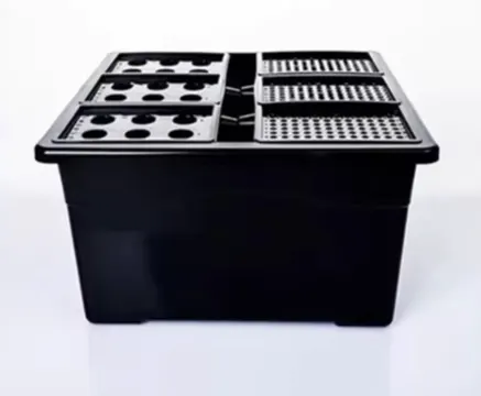 A black hydroponic tub with six removable perforated trays on top.