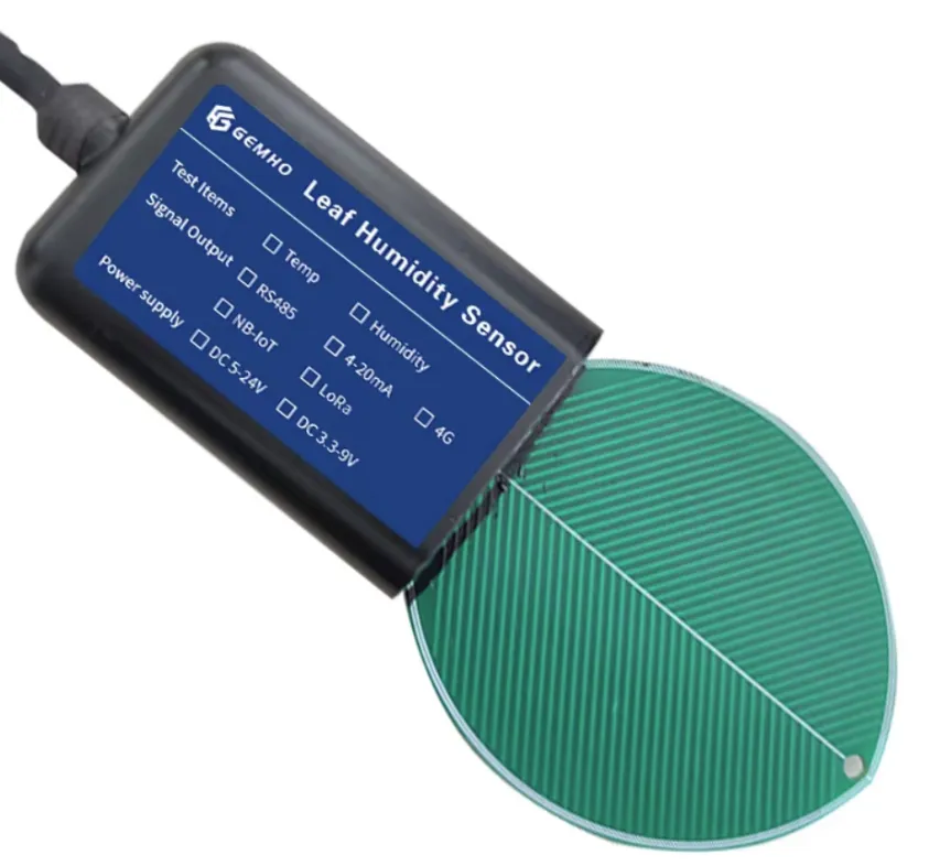 A leaf humidity sensor: a black housing with a blue label reading Leaf Humidity Sensor, a cable on one side and a green leaf-shaped sensing plate on the other.