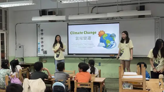 A team member presenting a climate change slide.