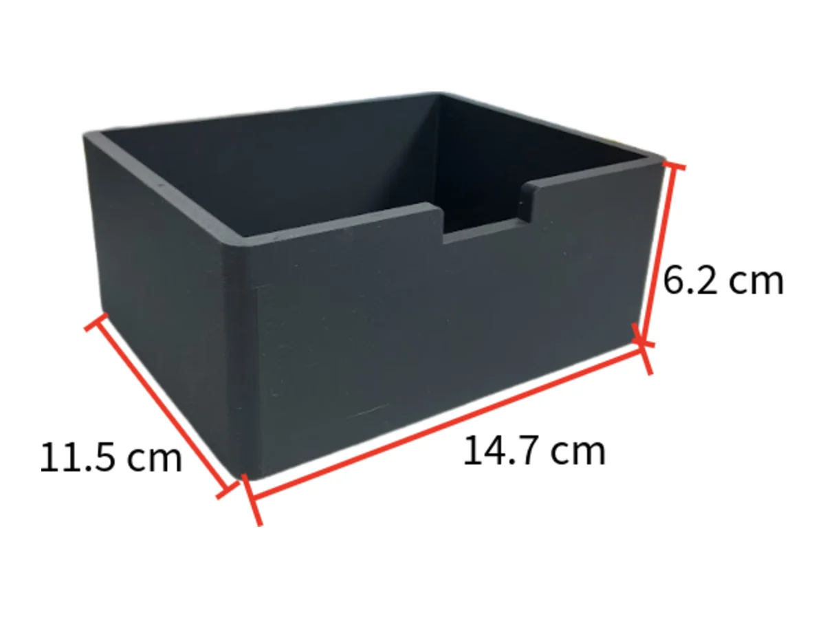 The black light-blocking box, 14.7 by 11.5 by 6.2 centimetres, with a notch cut in one side.