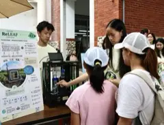 Visitors at the bioreactor prototype
