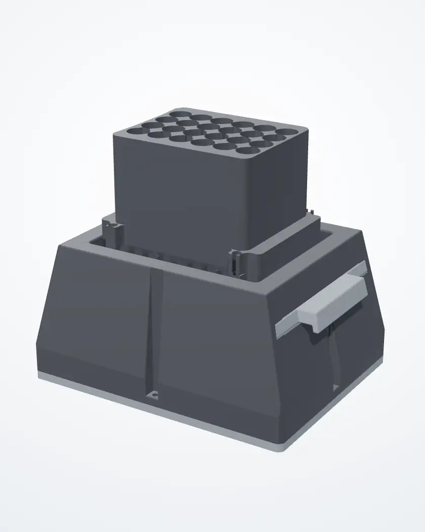 The LPA, assembled, at a three-quarter view: the black tube holder on the black housing, on its grey base plate, with the grey sliders at the sides.