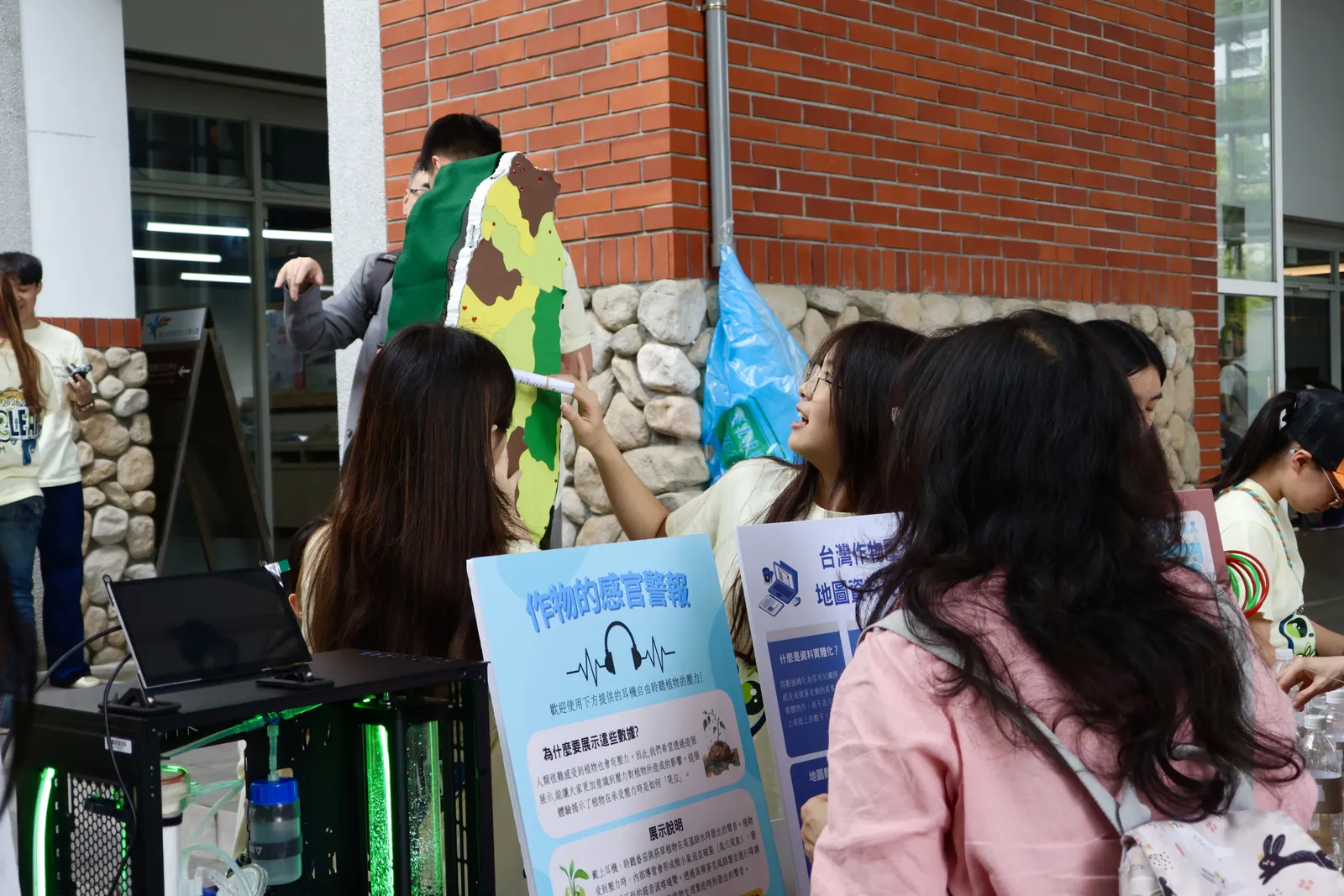 Visitors gathered around the data physicalization booth.